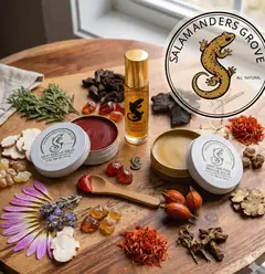 Three Salamanders Grove products arranged with botanicals